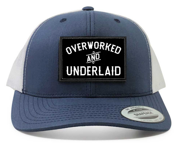 Over Worked And Underlaid Patch on Retro Trucker Patch Hat By Snapback - Navy White